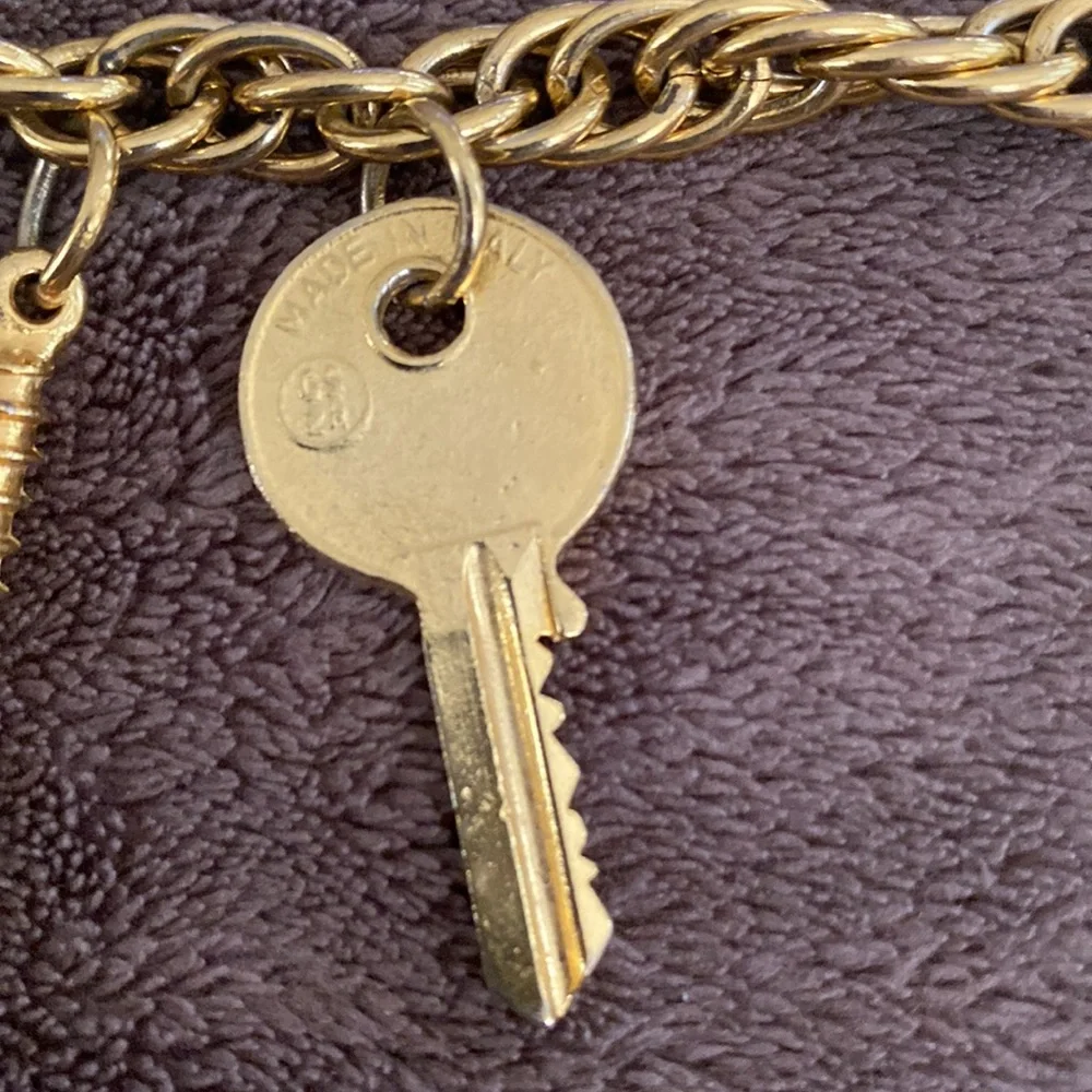 Vintage 1980s Rare Moschino Redwall 15 iconic brand gold charm necklace